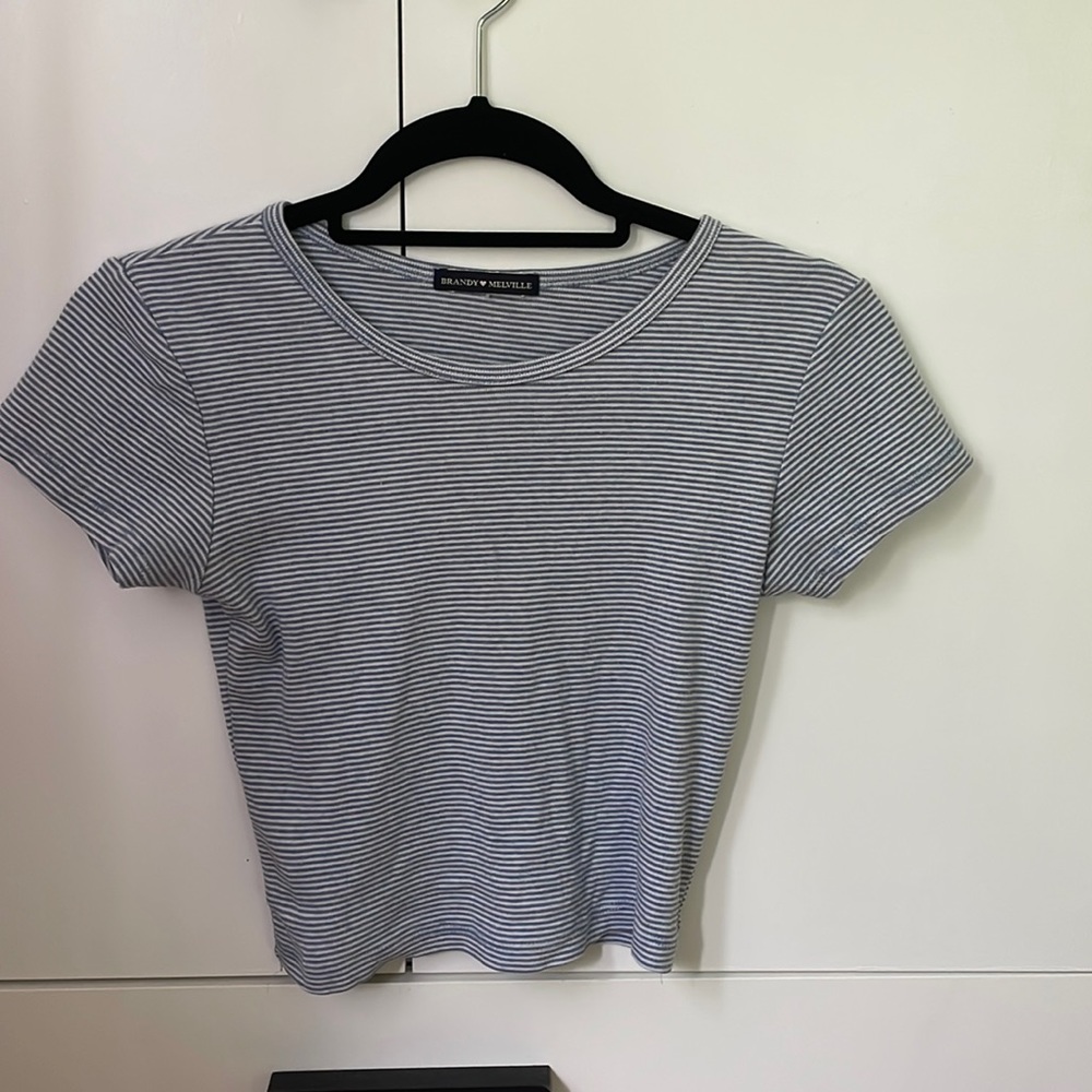Brandy Melville blue and white striped top. Great condition, small stain spot.